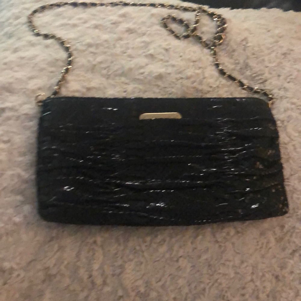 Michael Kors black python clutch purse.